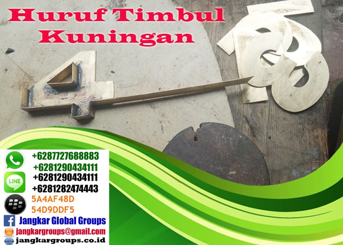 huruf timbul kuningan